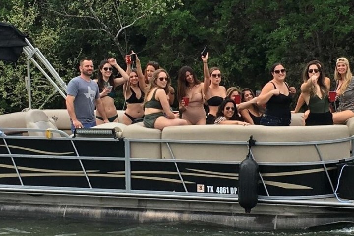 people partying on a pontoon boat